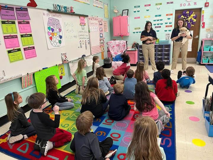 Abby and a member of the Westview Chapter working towards Ag In the Classroom.