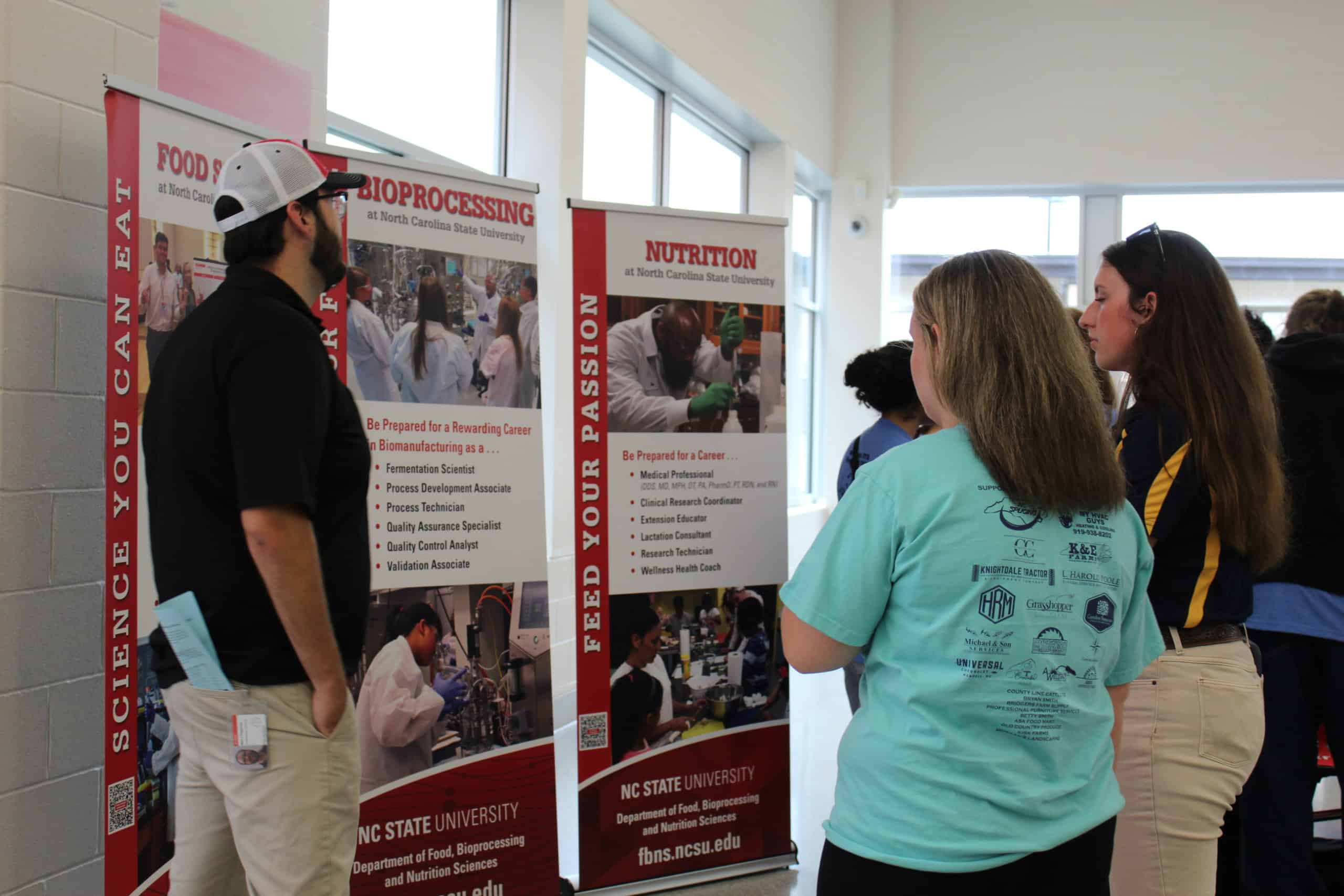 North Carolina State University representatives speaking to students about postgraduation opportunities.