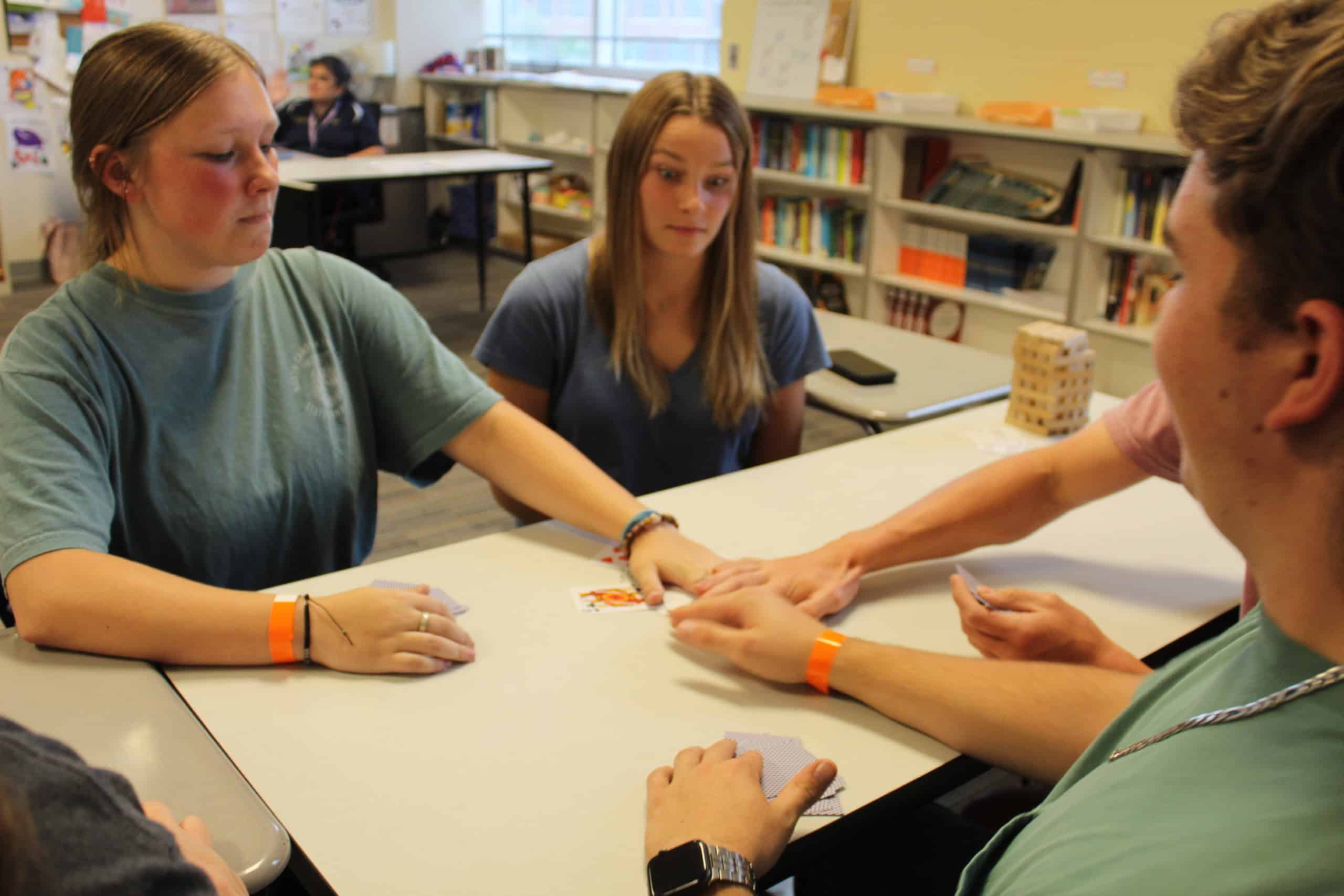 Students playing cards during Brain Break.