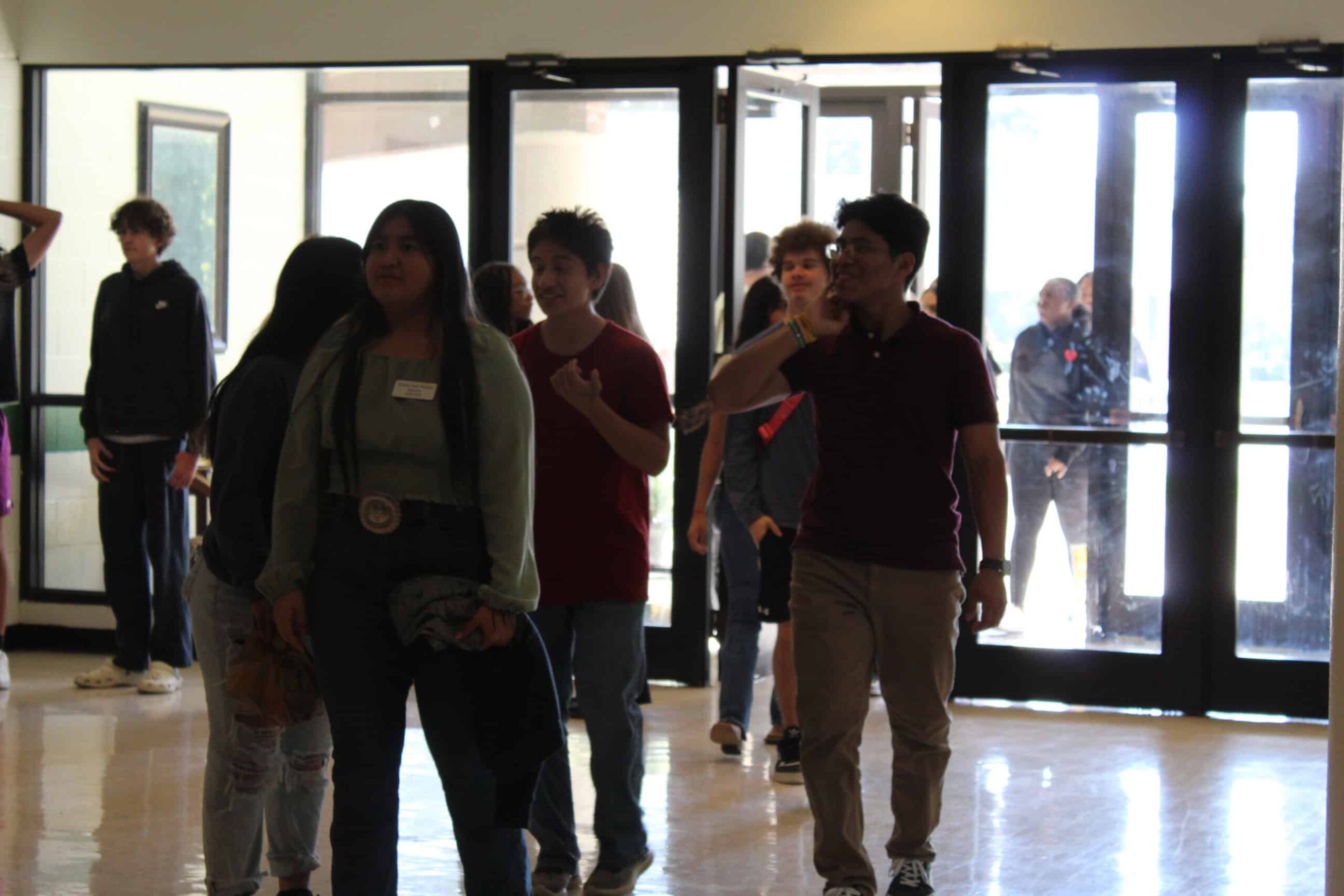 Students entering North Lenoir High School for registration.