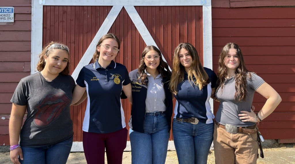 Gossett poses with Norfolk FFA officers during her chapter visit. From left, Ava Belanger (historian), RoseMary Gaulin-Mainville (junior secretary), Emily Gossett, Gabriella Pannone (vice president), and Isabel Furkart (junior sentinel).