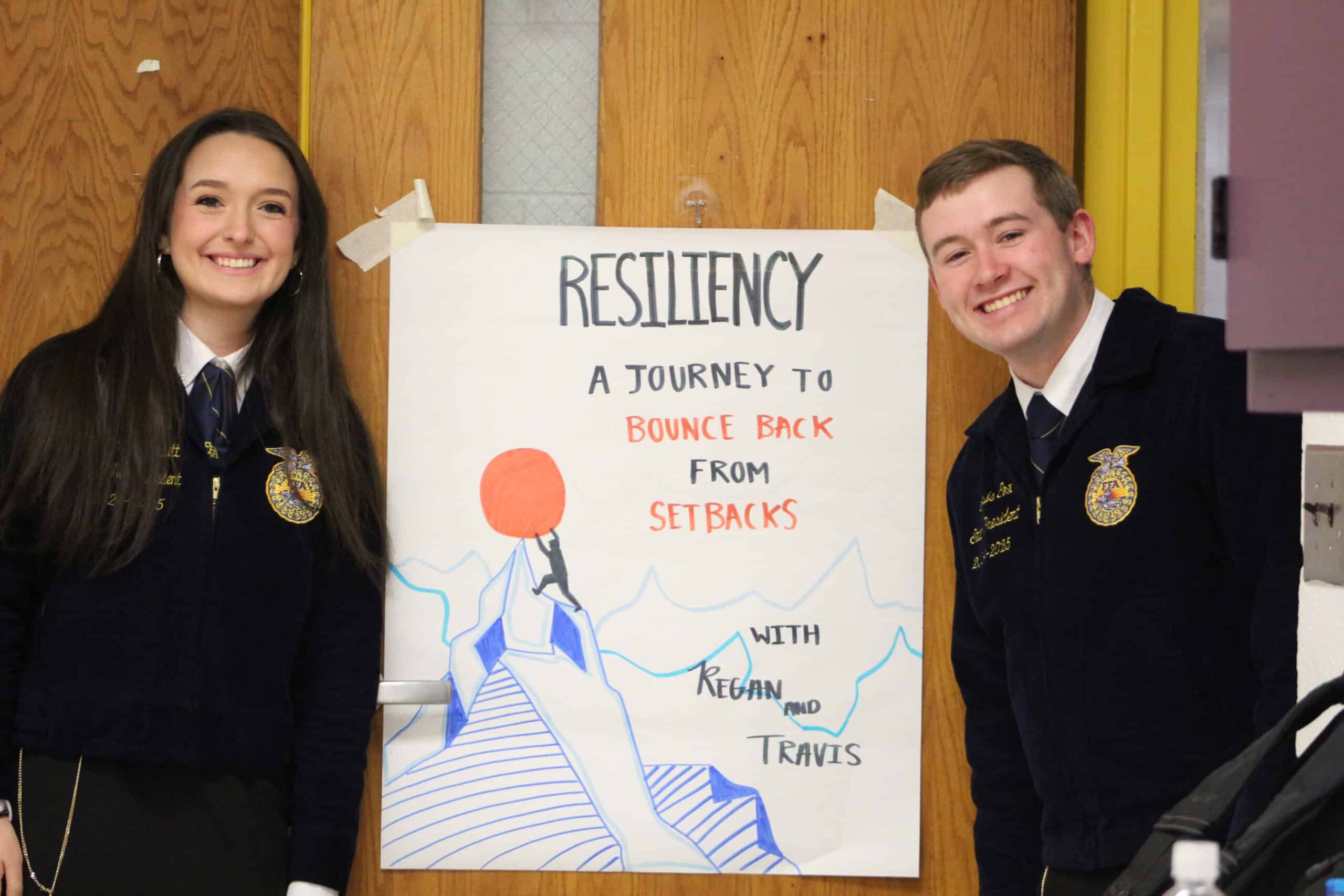 Regan Honeycutt and Travis Cox with their workshop about the importance of resilience.