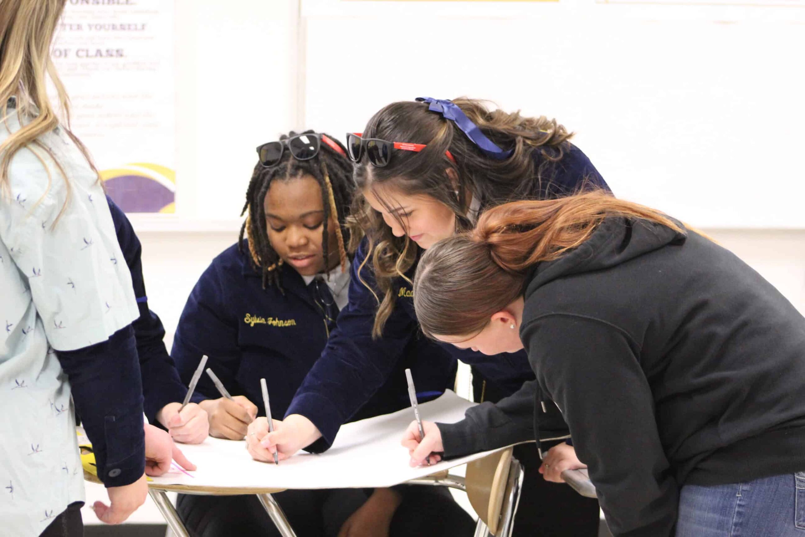Students engaged in a workshop.