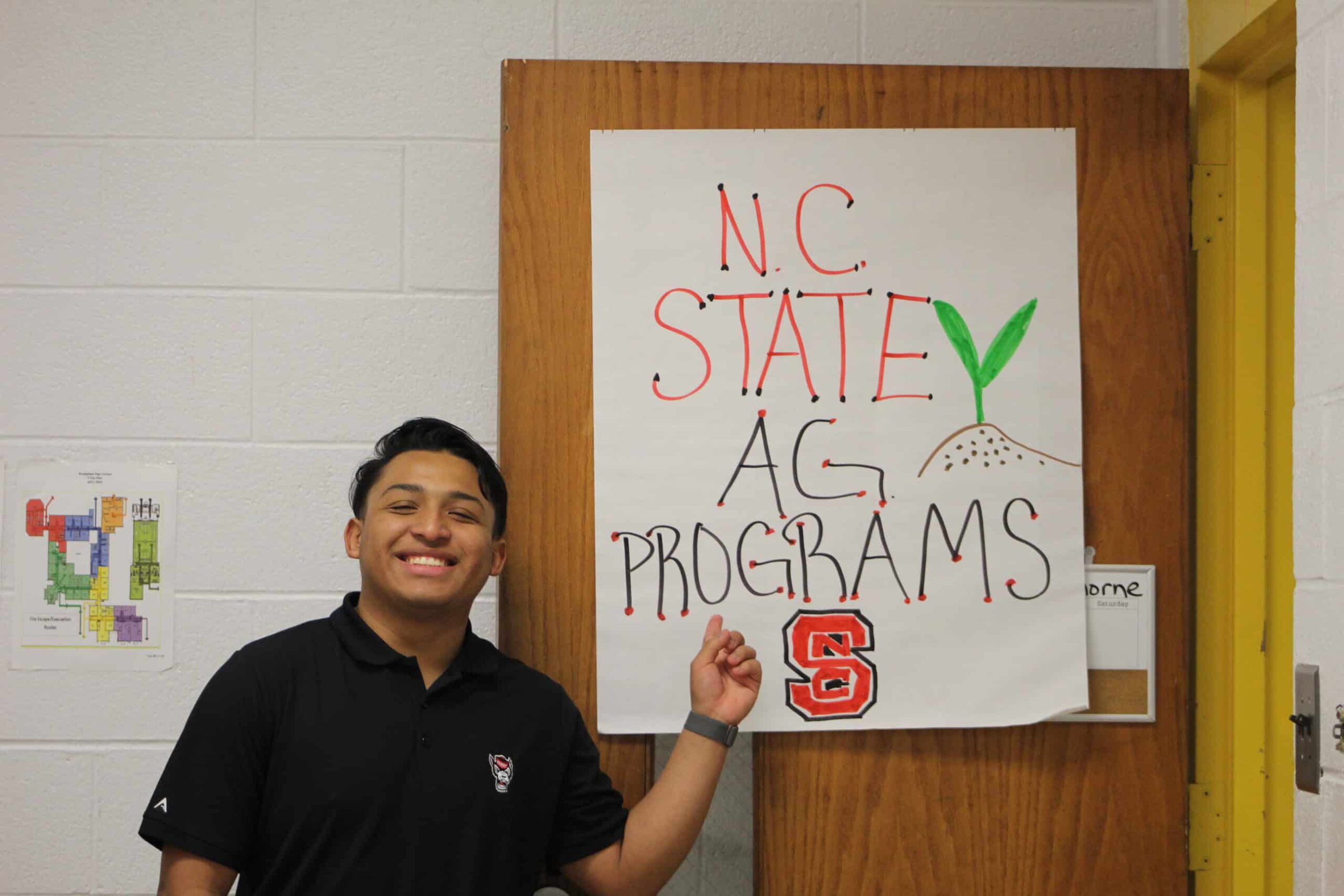Junior Torres proud of his NC State logo drawing.
