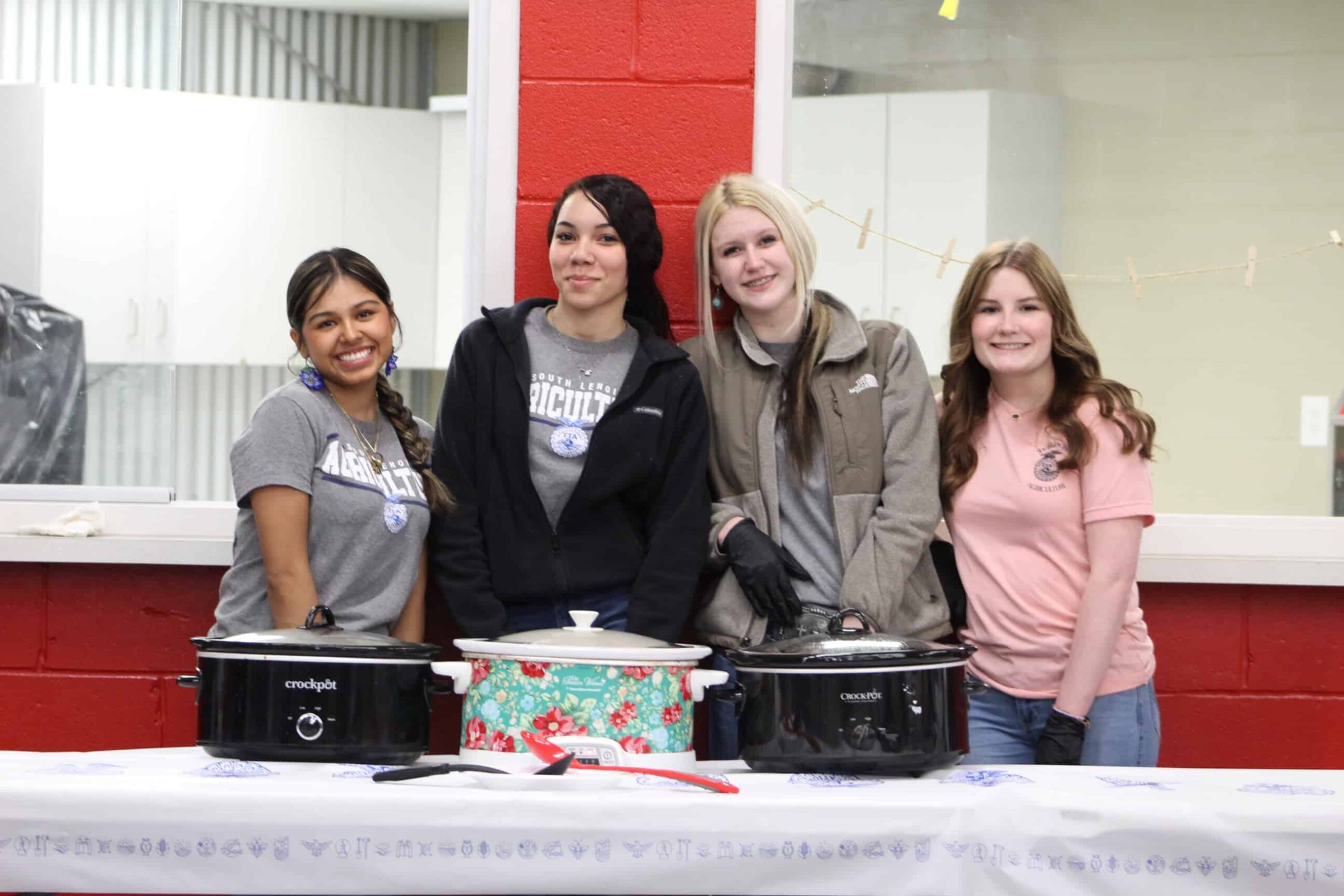 FFA members excited to be serving food to guests.