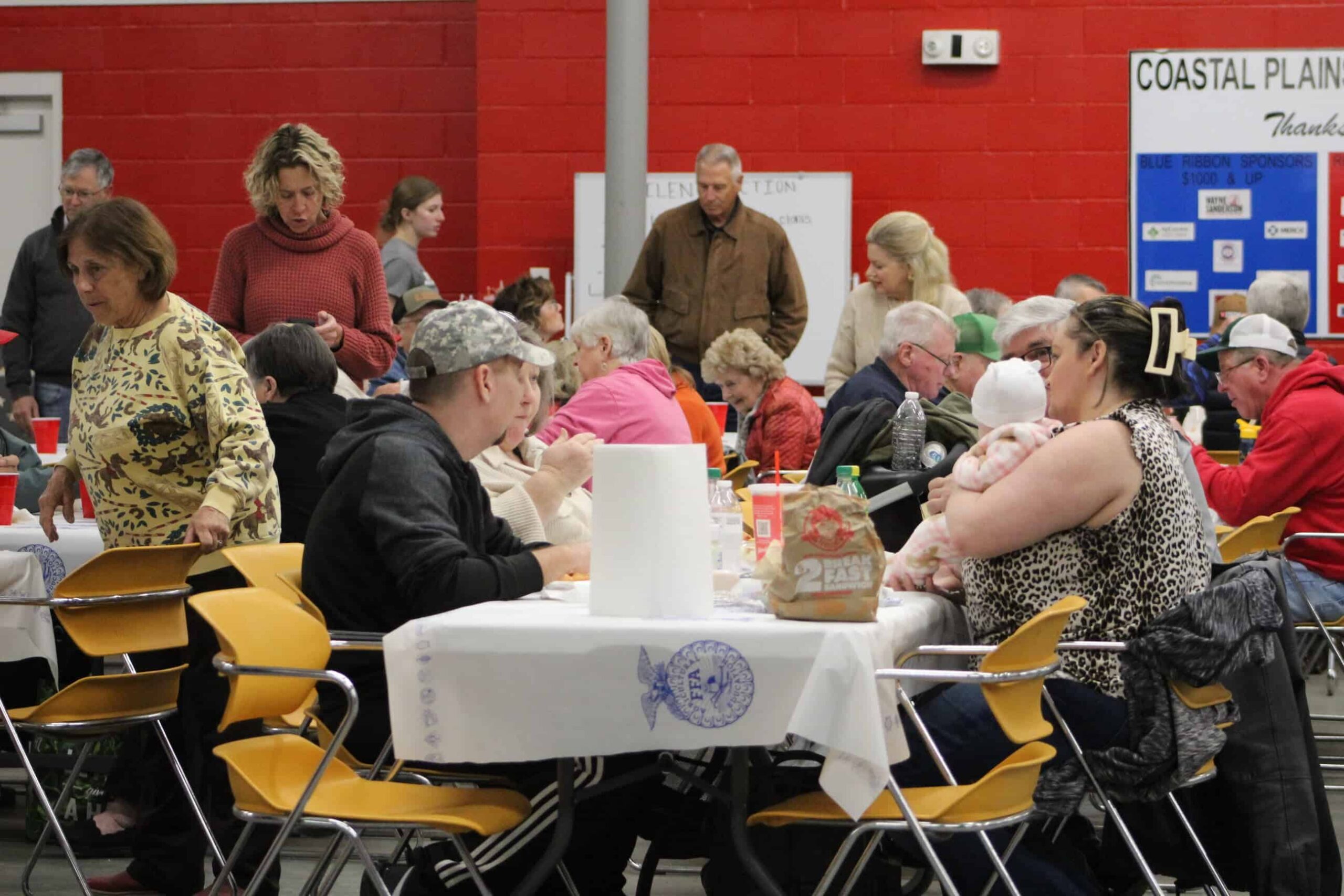Guests seated at their tables.