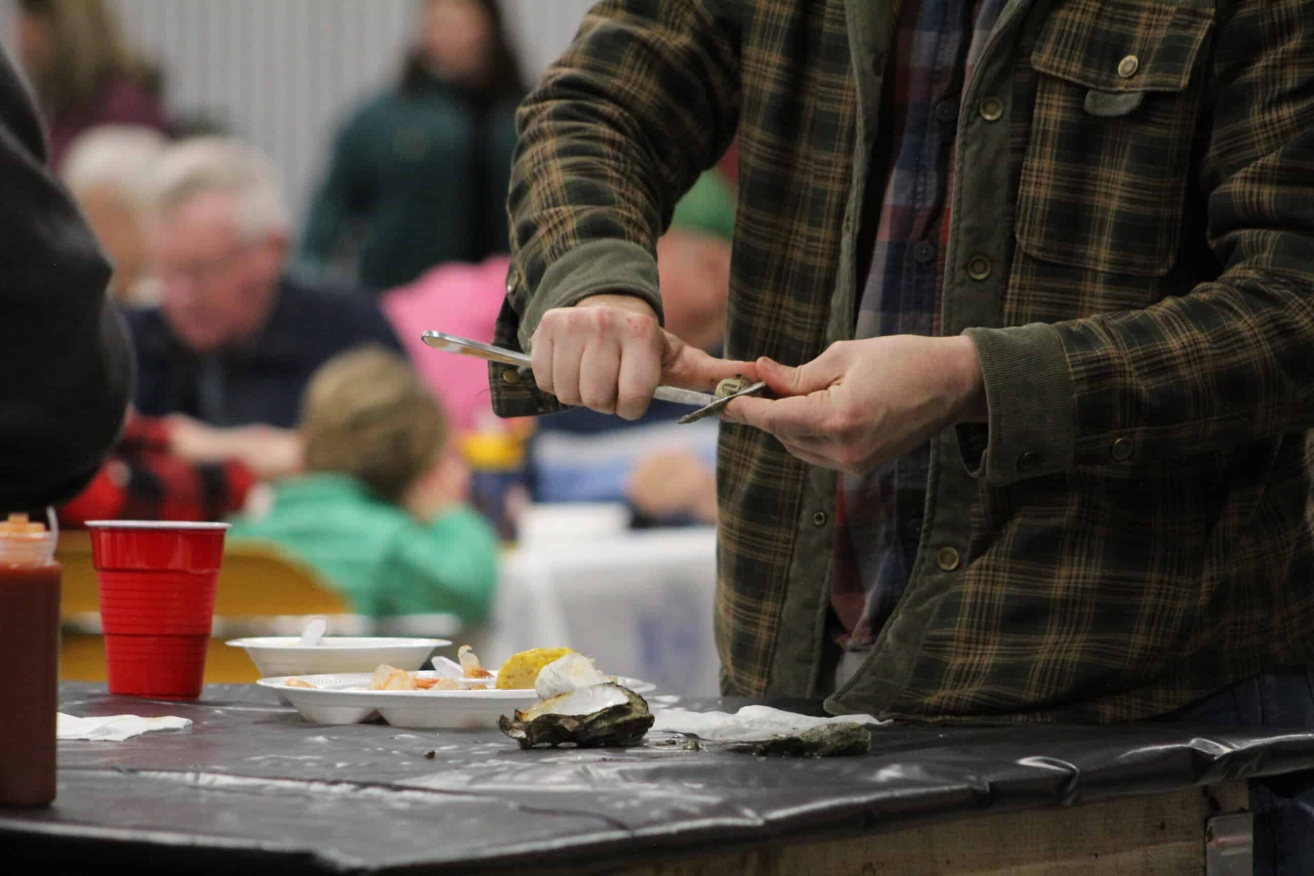 Oyster being shucked.