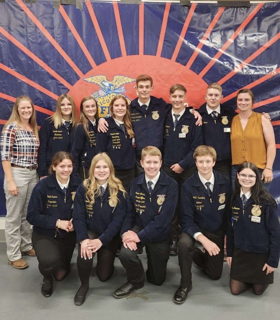 Collin smiles with the Montrose FFA Chapter at the Colorado FFA state convention.