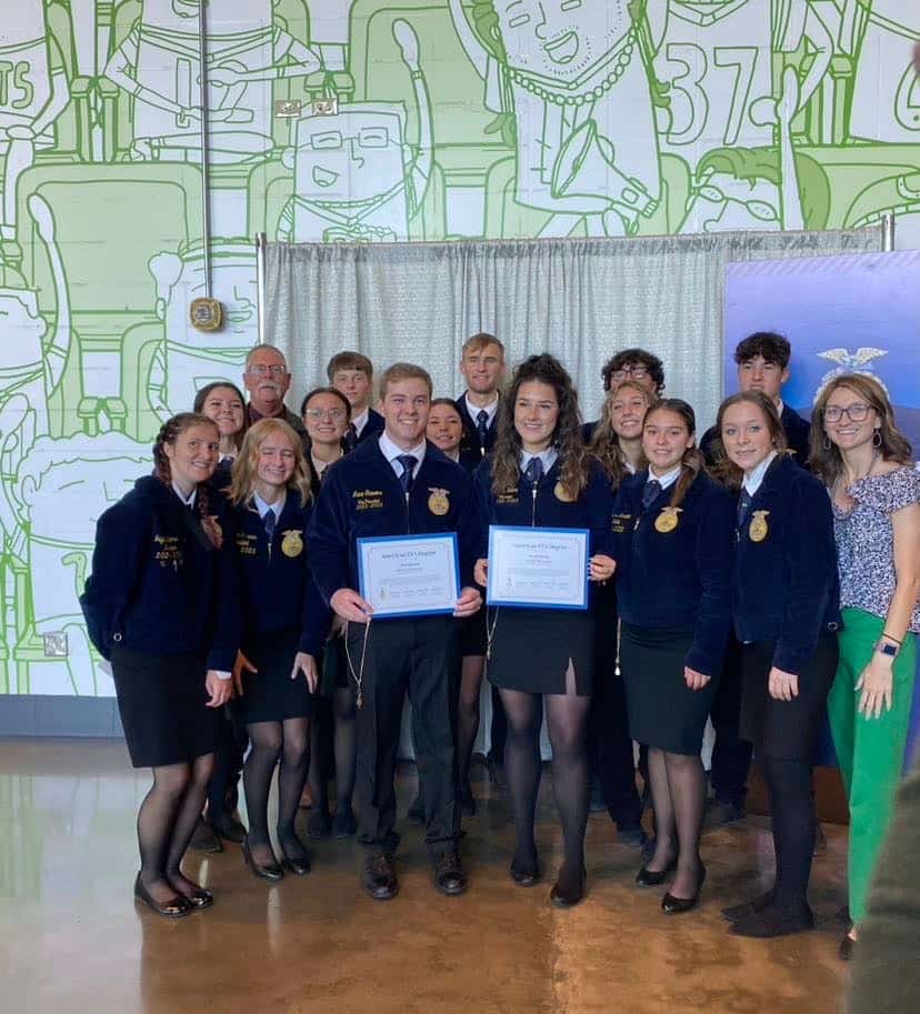 Lane Stevens with his home chapter, Highland FFA, after receiving his American FFA Degree at the 97th National FFA Convention & Expo.