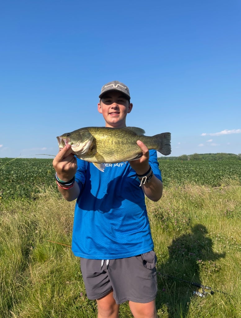 Southmont FFA member Hunter Thompson smiles with a fish he caught.