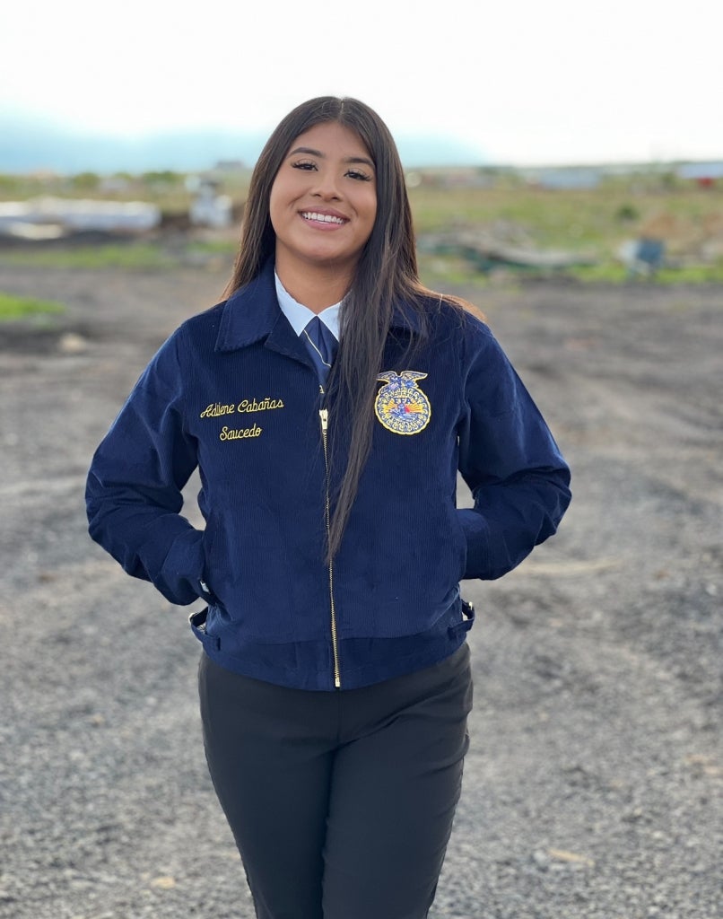 Adilene Cabañas Saucedo smiles in her FFA Official Dress.