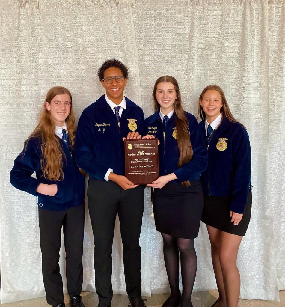 Taylor (third from left) and her teammates earned fourth place in the National FFA Agricultural Communications CDE.