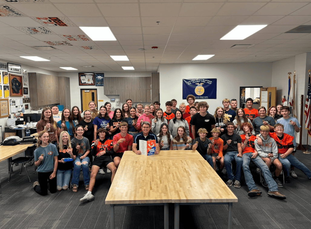  Mr. Mark Steber is pictured with the current RCHS students whose parents were also in class with him throughout his 34-year career. 