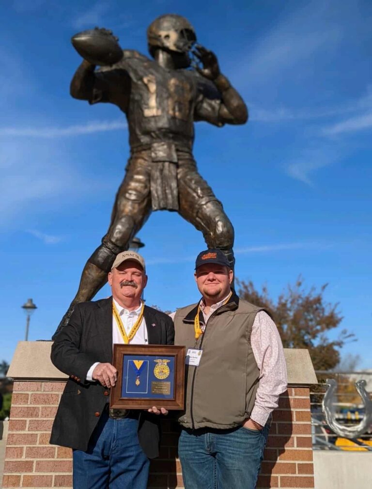 L to R Brandon and Jake Devine pose for a picture after receiving his honorary American degree.