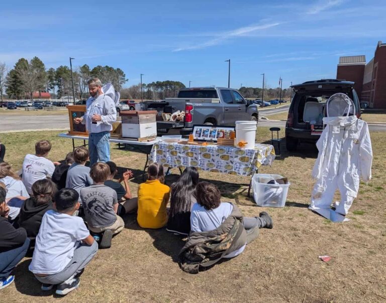 Journeyman Beekeeper, Ted Williamson provides elementary students insight into the world of Bees, at NECP.