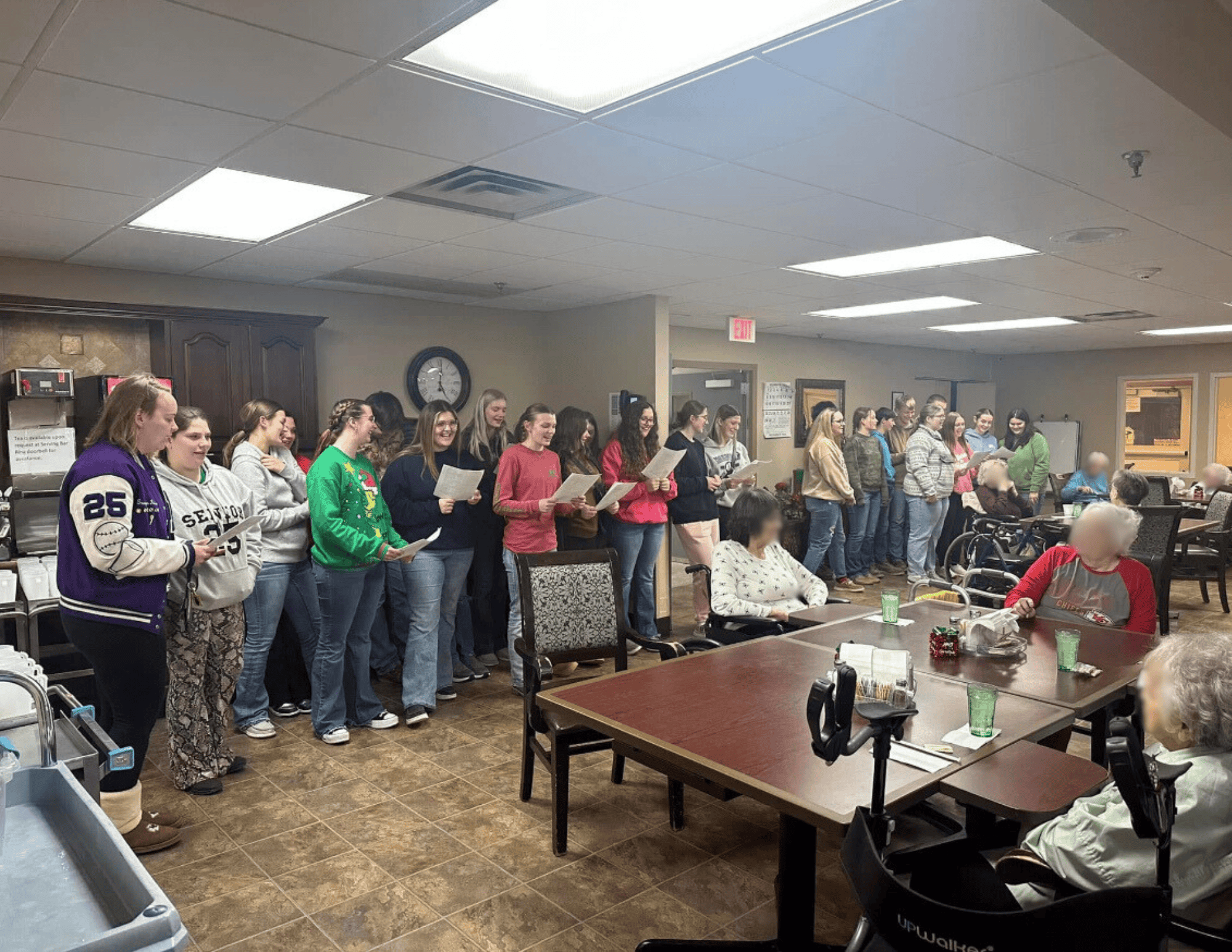 Meadville FFA members sing carols at their local nursing home.
