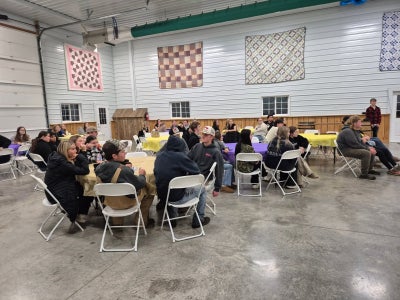 Members from both chapters listening to the joint Opening Ceremonies. 