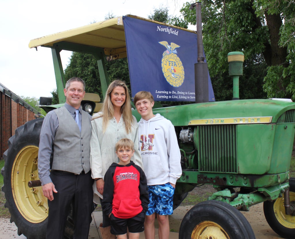 Mr. Austin, the chapter advisor, and his family at the 2024-2025 chapter banquet. 