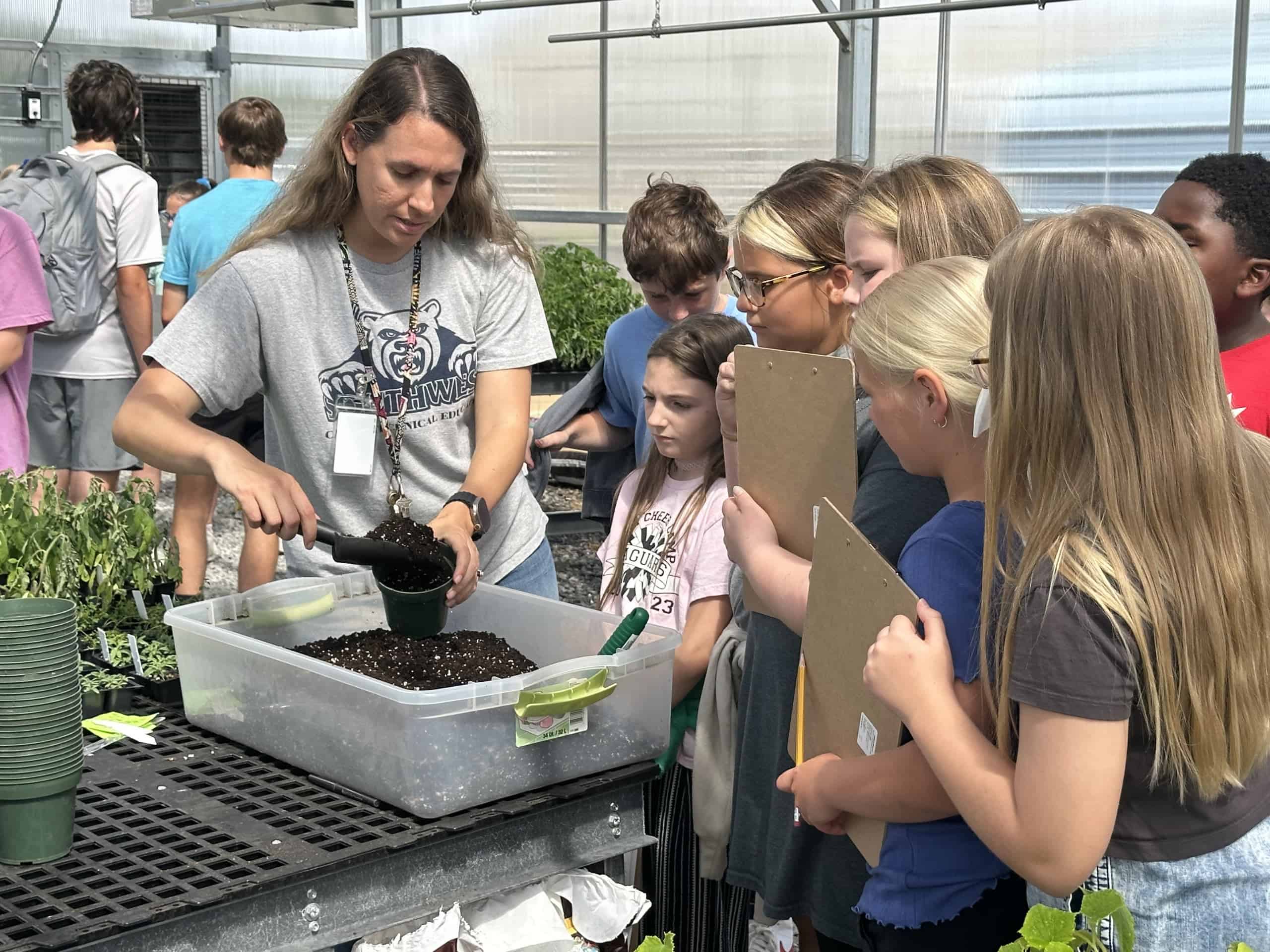 North Pike FFA educates elementary students about the process of how their food is grown. 