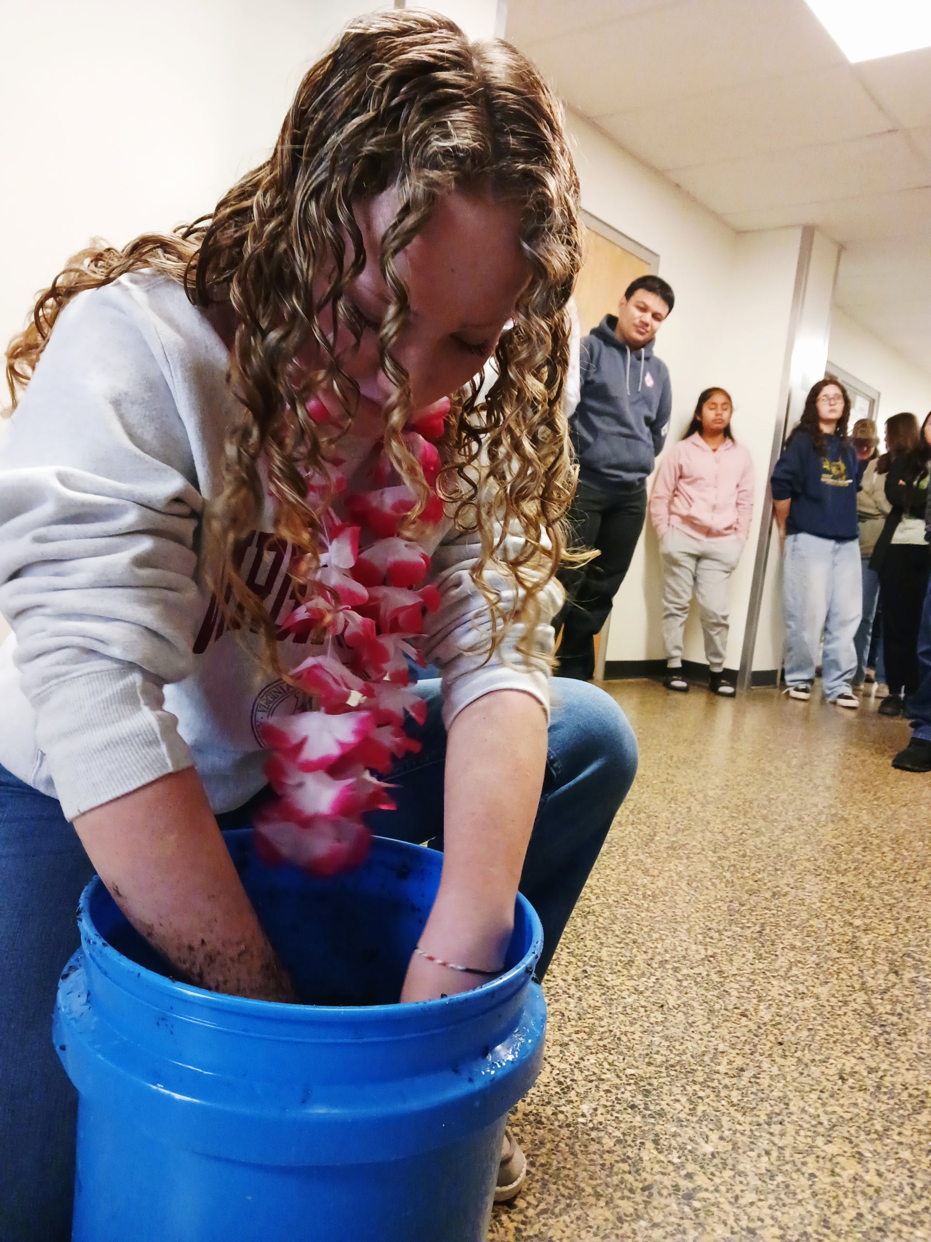 Chapter members participate in the 2024 Mud Madness morning warm-up challenge, a staple of the Culpeper County FFA Chapter’s National FFA Week celebration.
