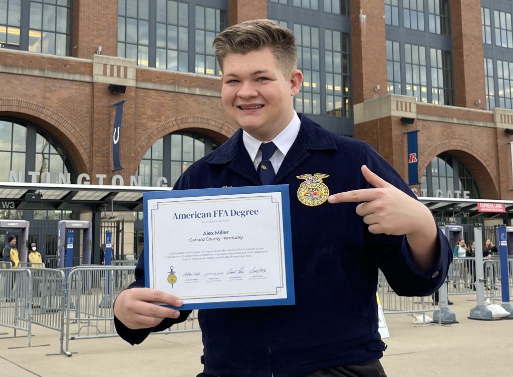 Alex getting his American Degree at the National FFA Convention 