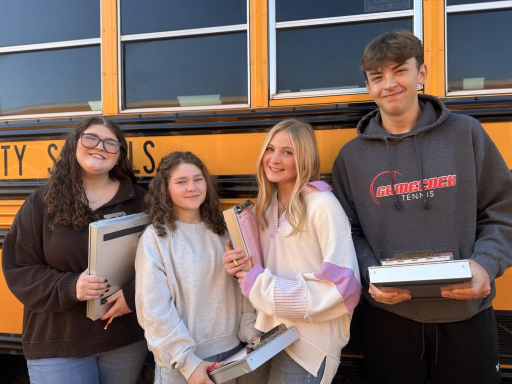 Boykin (far right) and his fellow floriculture members prepare to compete at the area competition. During this competition, Boykin won high individual and placed first overall.