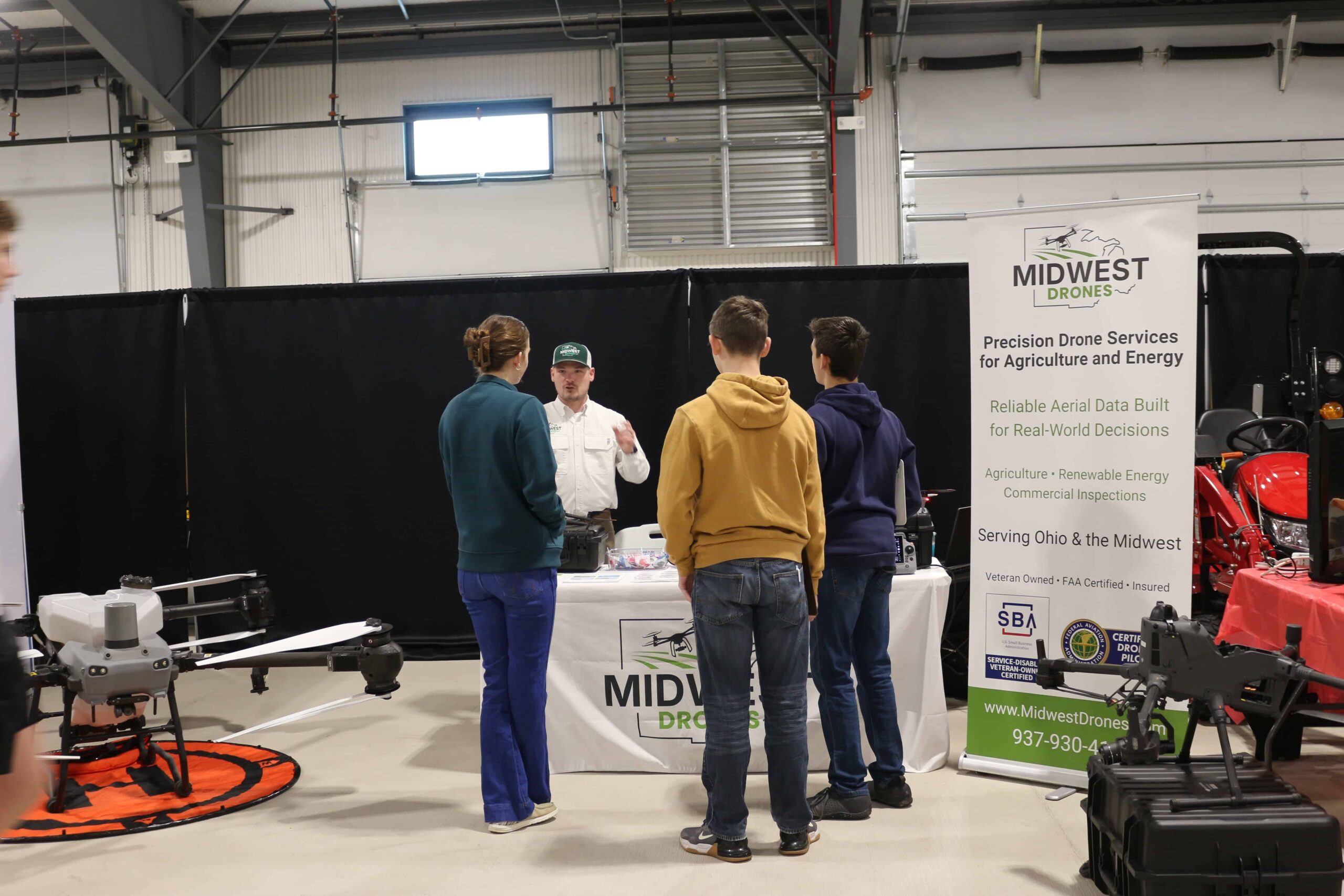 FFA members talk to an exhibitor from Midwest Drones.