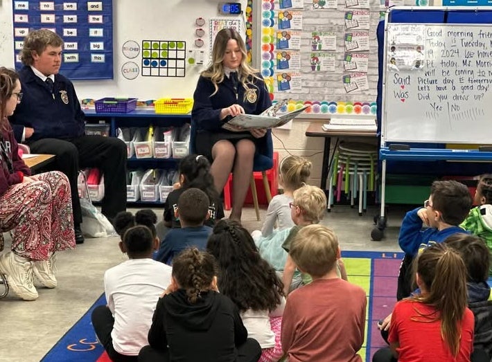 Members and students participate in the Ag Literacy Week book reading.