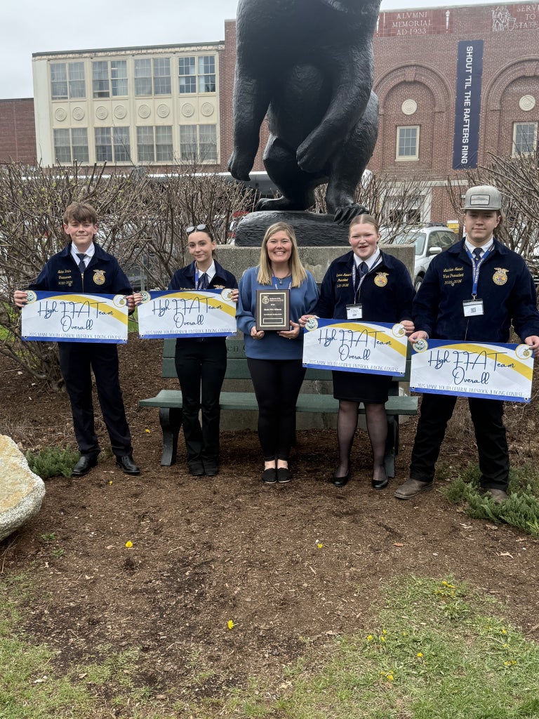 Nolan Davis, Lea Marchesseault, Brittany Hemond, Sierra Hemond and Lachlan Newell pose for a picture after winning high overall livestock evaluation team.